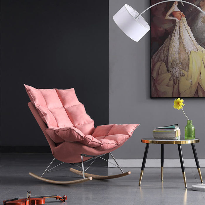 pink armchair with footrest